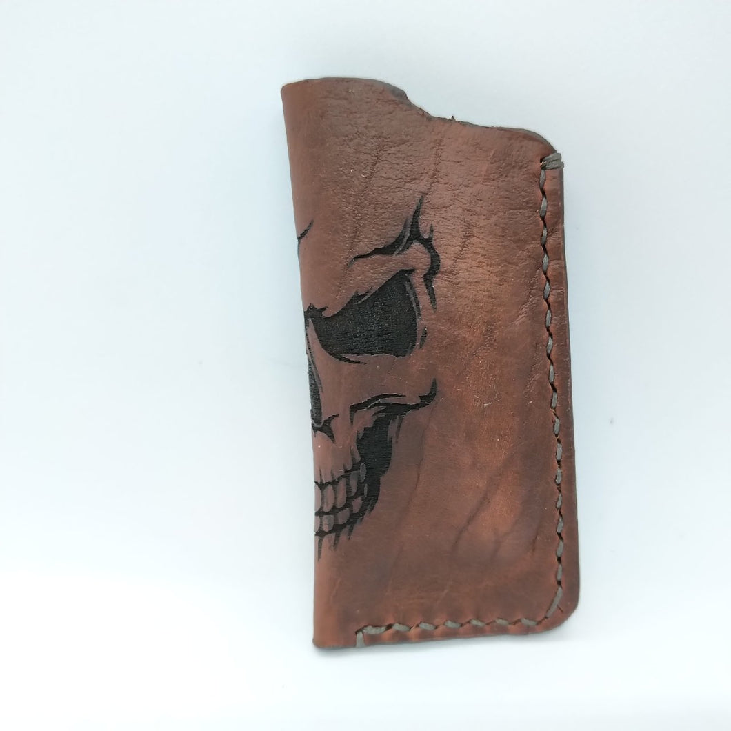 Wrap around skull lighter cover